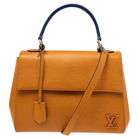 louis vuitton lock me nomade|Louis Vuitton leather handbags.